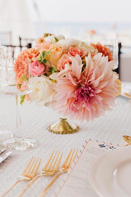 gold vases with coral pink dahlia wedding centerpiece