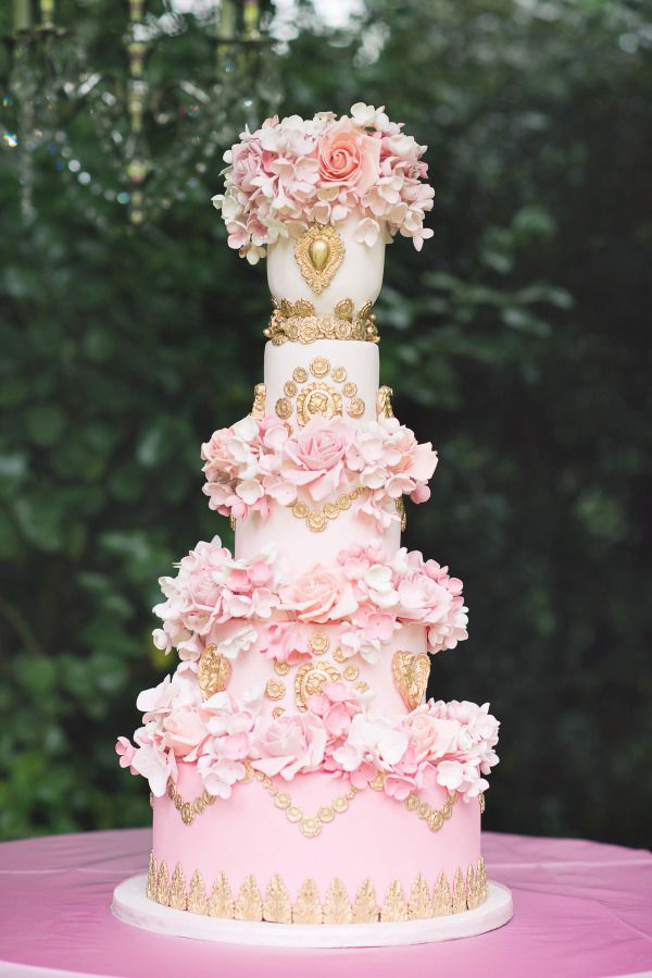 grand pink and gold wedding cake
