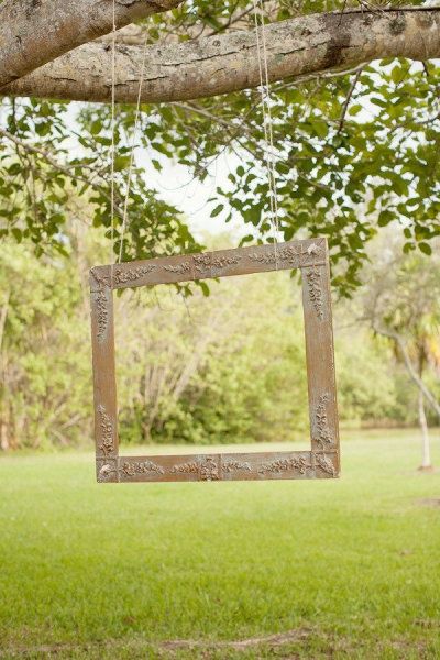old frame into a fun photo booth for an outdoor gathering