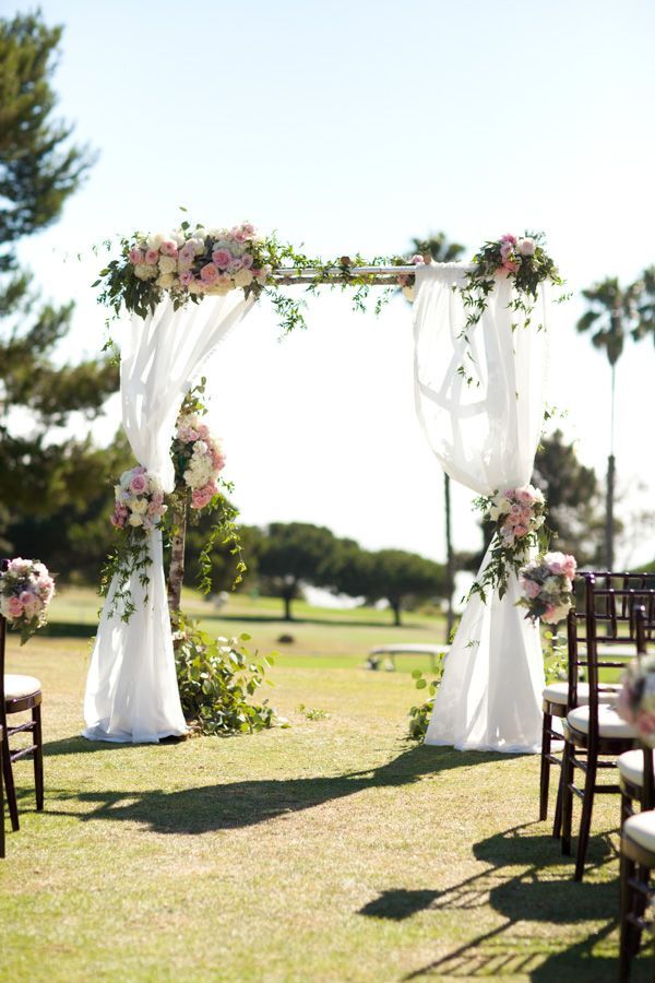 pastel flowers wedding arch