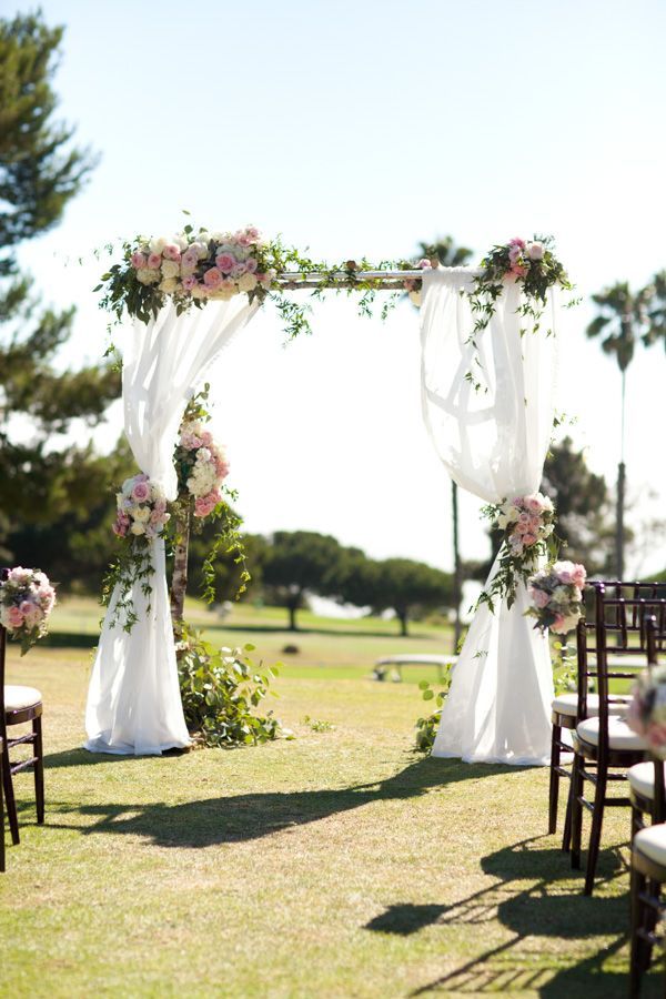 25+ Stuning Wedding Arches with Lots of Flowers 11 pastel flowers wedding arch