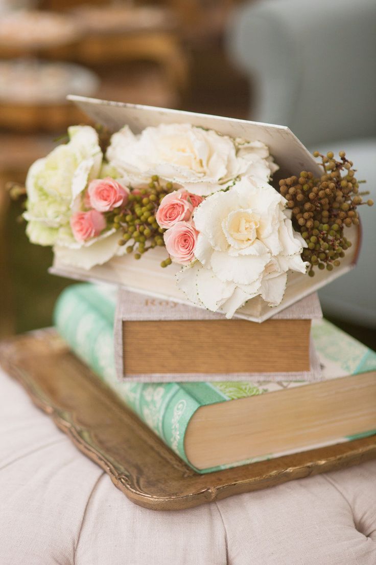 pastel vintage flowers in book mint wedding centerpiece