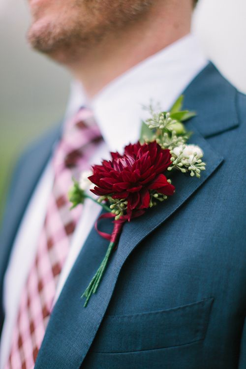 red dahlia boutonniere