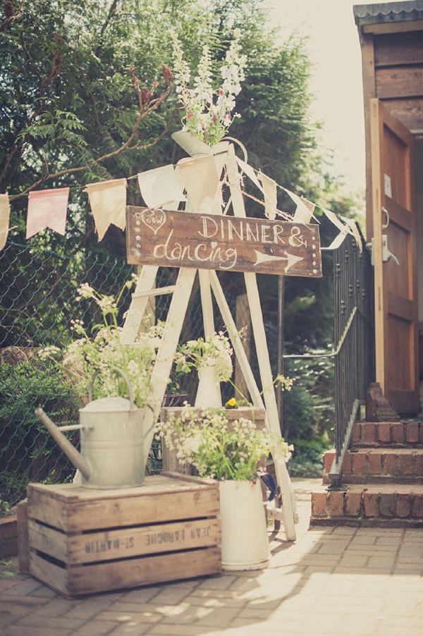 rustic and vintage wildflowers in watering can wedding ideas