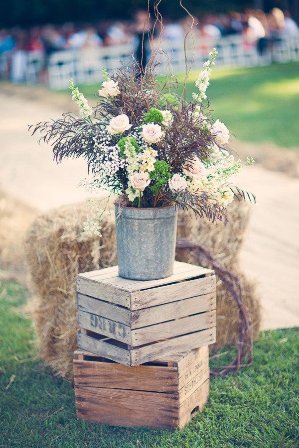 rustic country wedding ideas- haybale and wildflowers wedding decor ideas