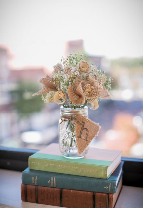 rustic wedding centerpiece- baby's breath and burlap in mason jar book centerpiece3