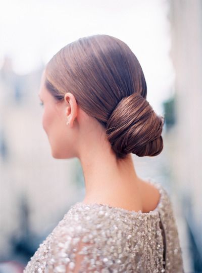 sleek wrap bun hairstyle for wedding