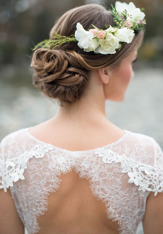 updo wedding hairstyle with white fresh flowers