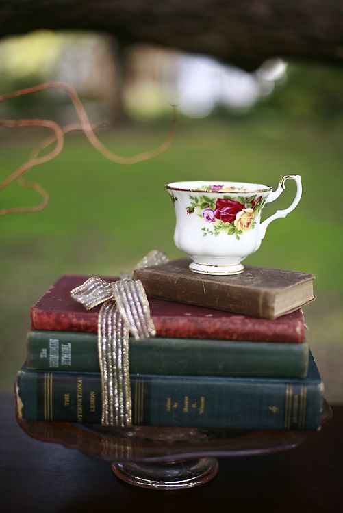 vintage books + tea cup wedding centerpiece