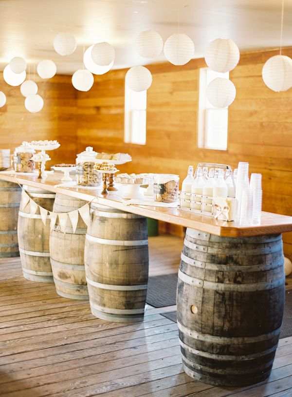 vintage wine barrels unique table which fits in with the rustic themed weddings