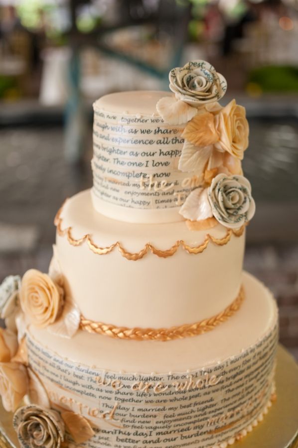 wedding cake with script from the newlyweds' favorite poem about marriage