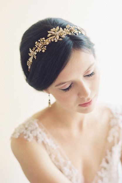 wedding updo with gold hairpiece