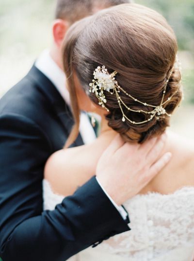 wedding updo with hair accessory