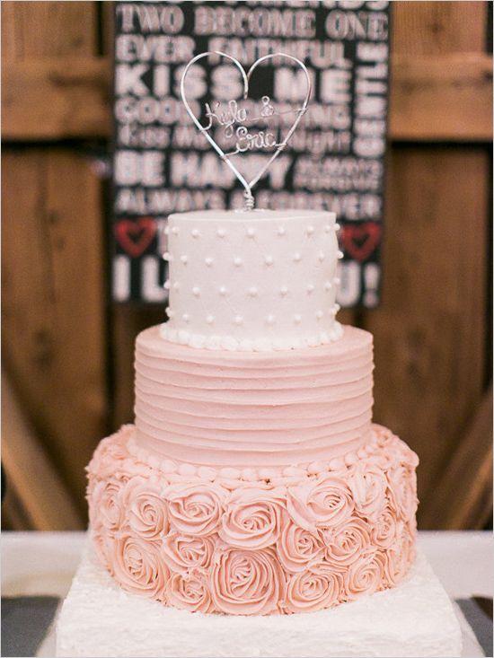 white and rose colored wedding cake