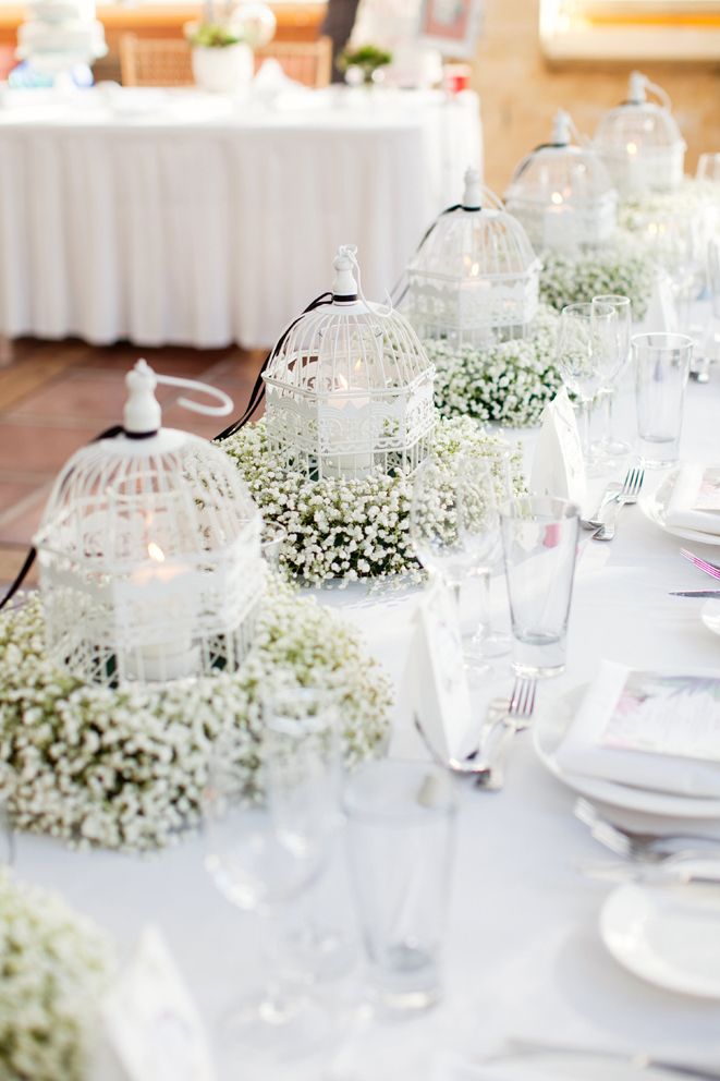 55+ White Wedding Ideas for Romantic Wedding 56 white birdcage and baby's breath vintage wedding centerpiece