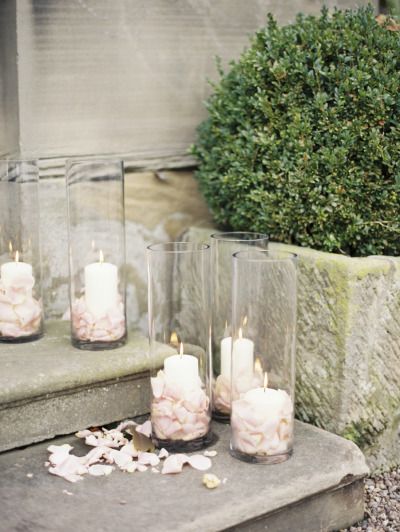 white candles with pink petals