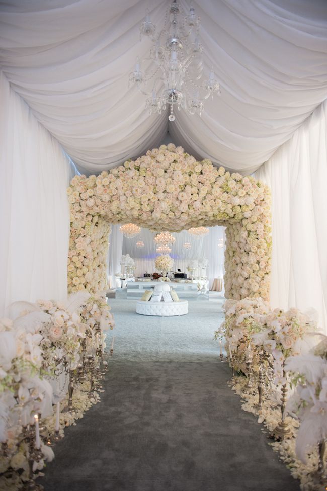 white flowers wedding arch alter