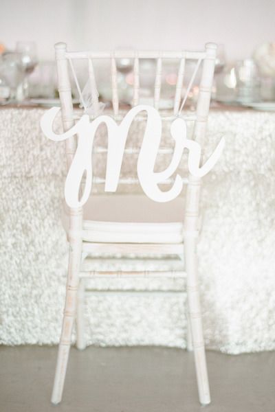 white wedding decor ideas- The groom's chair
