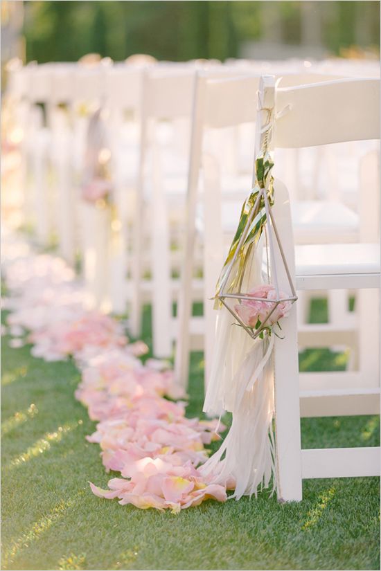 Flower petal and tassel aisle decor