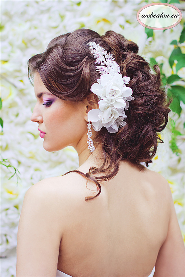 French braided updo wedding hairstyle with chiffon flowers