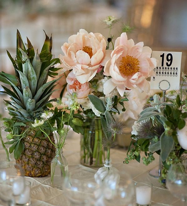 Pineapples and flowers wedding tablescape