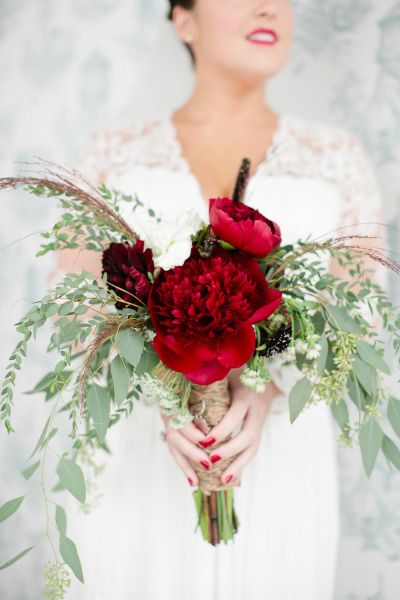 Red garden roses with a pop of white bouquet
