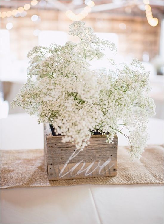 Simple wooden boxes with bouquets of Baby's Breath