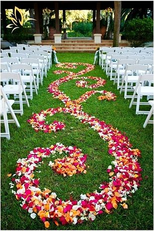 an aisle runner out of rose petals.