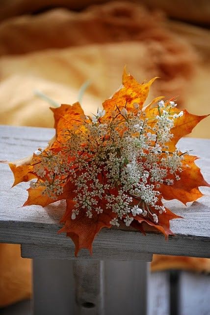 baby's breath and fall leaves wedding bouquet
