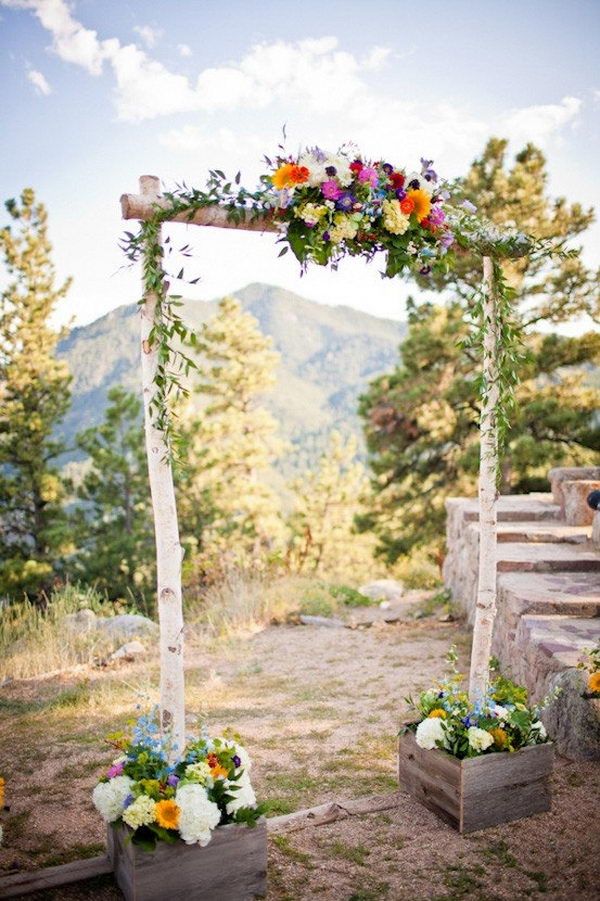 birch poles rustic wedding arch