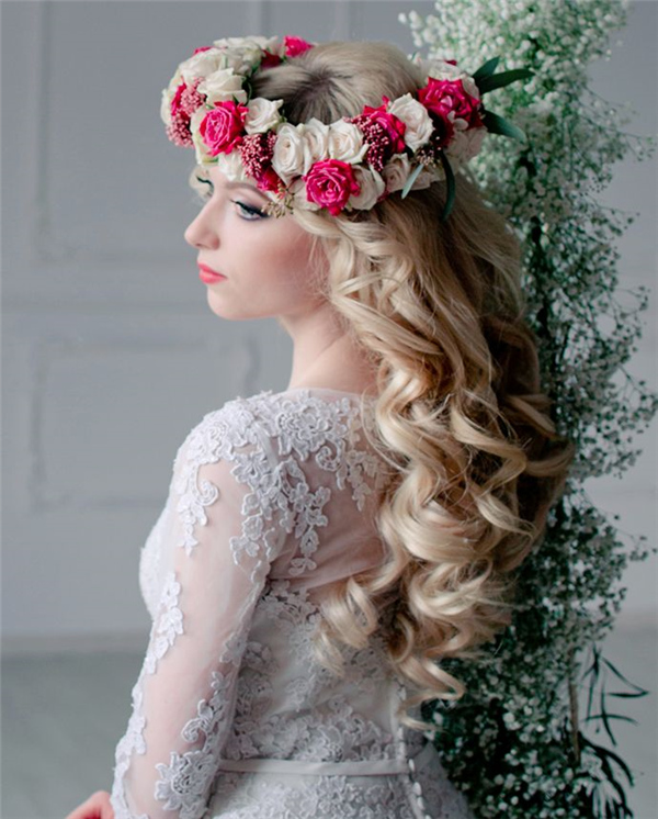 blond long curly wavy wedding hairstyle with flower crown