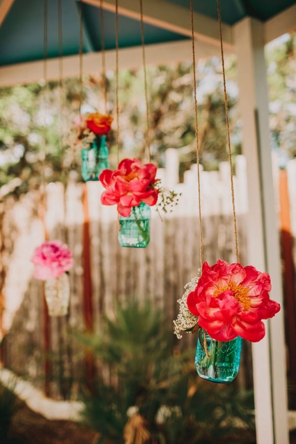 blue mason jars with hanging with peonies