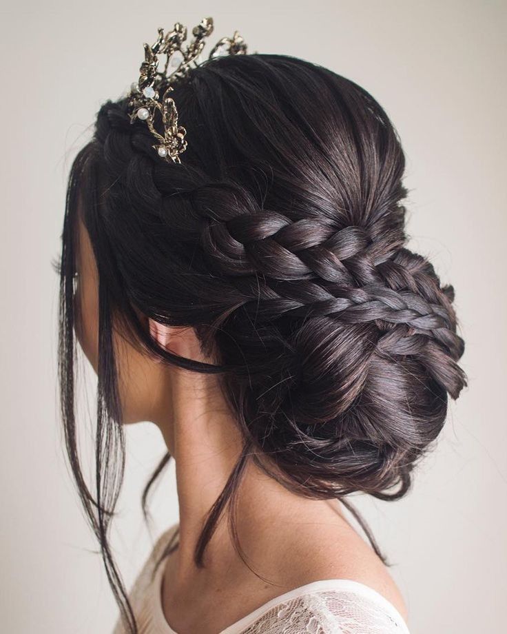 braided quinceanera updo hairstyle with a crown