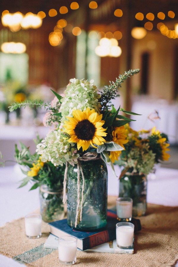 Something Blue: 45 Rustic Blue Mason Jars Wedding Ideas 17 centerpieces with burlap square, aqua mason jars and books