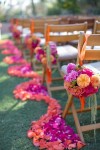 coral and purple petal wedding aisle decor