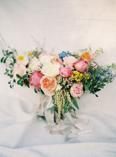 coral pink blue and yellow bouquet