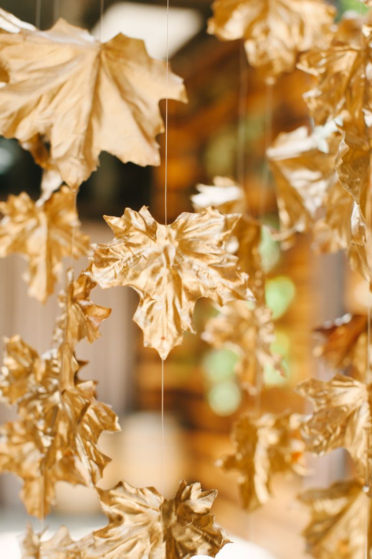 40+ Gorgeous Fall Leaves Wedding Ideas 21 fishing line hung gold painted leaves