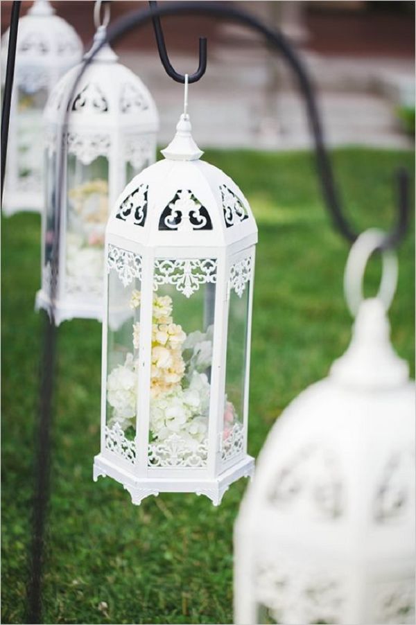 flower filled lantern wedding aisle decor