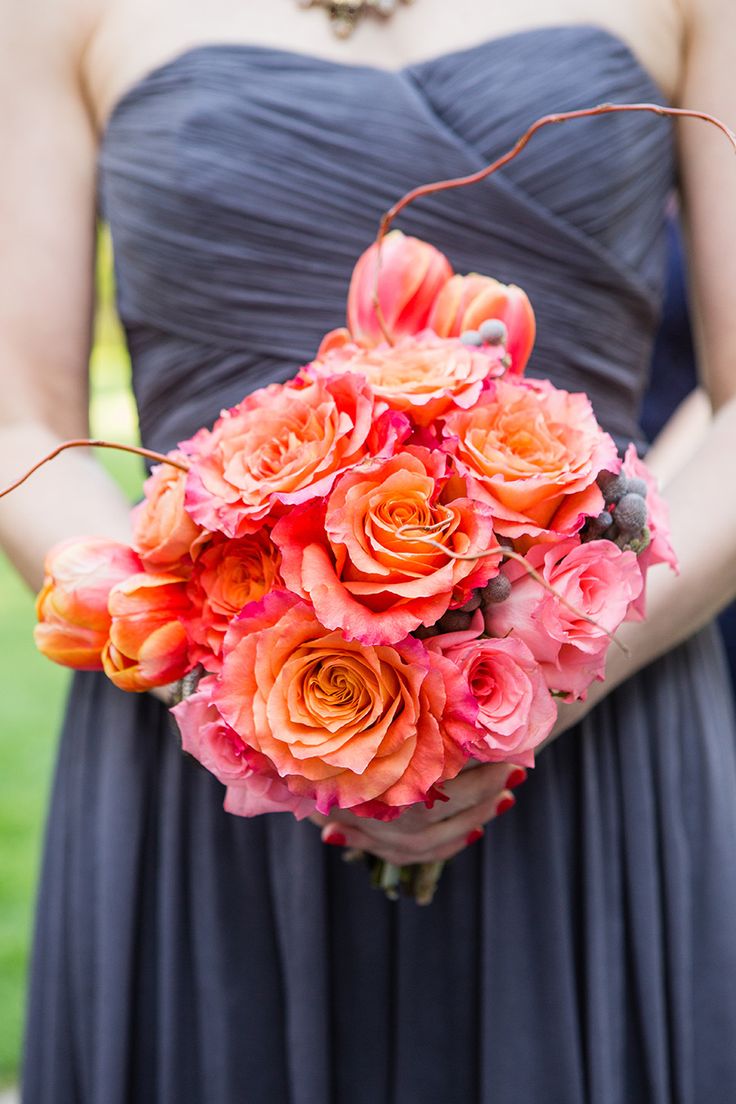 grey bridesmaid dress and coral bridesmaid bouquet