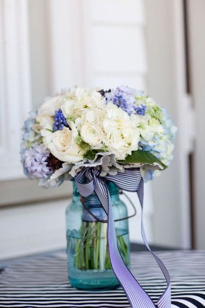 Something Blue: 45 Rustic Blue Mason Jars Wedding Ideas 20 ivory and blue wedding bouquet in blue mason jar