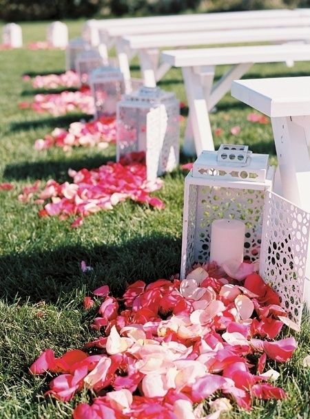 lantern open and the roses spilling out wedding aisle decor