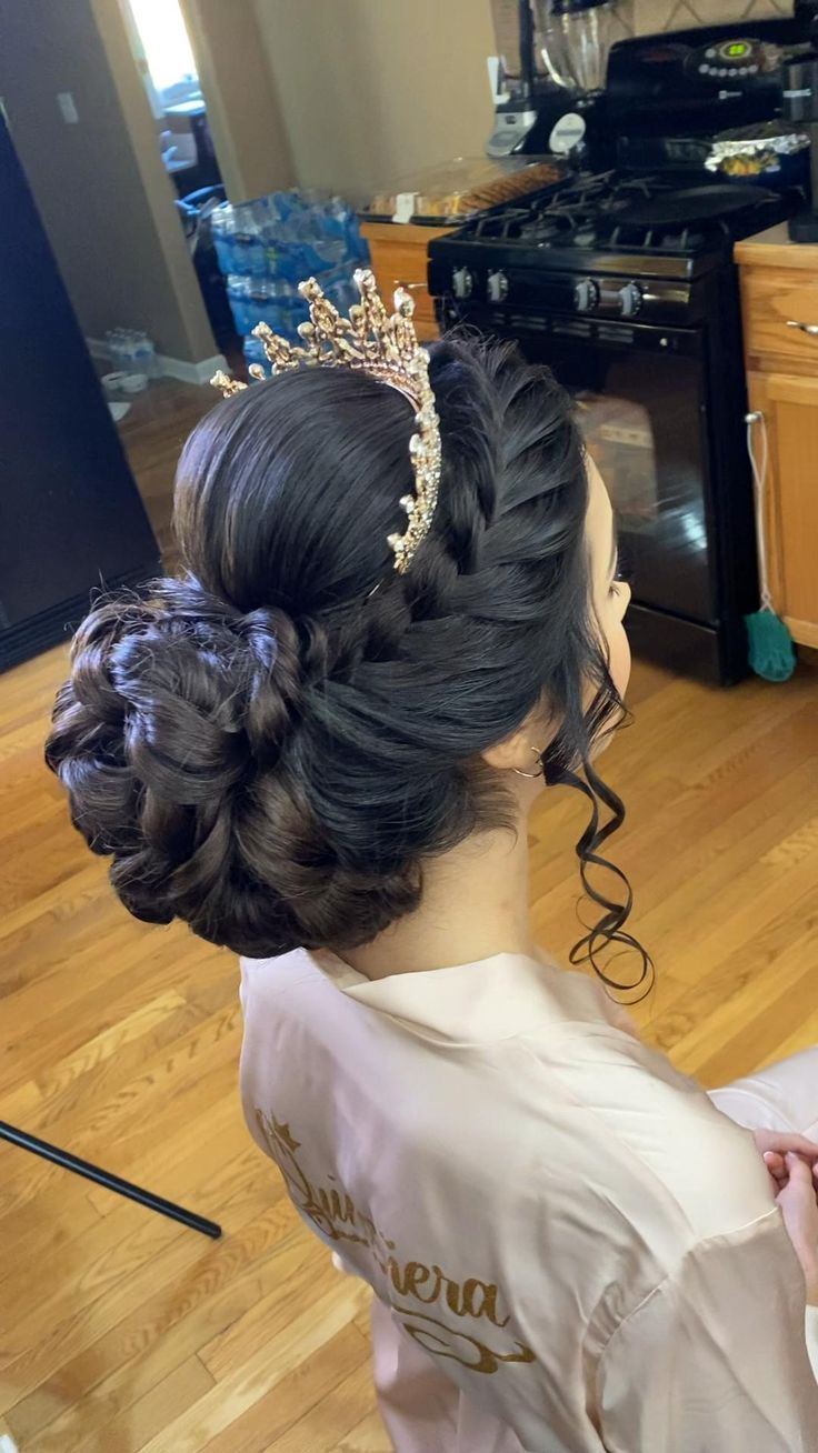 long wavy quinceanera updo hairstyle down with a crown