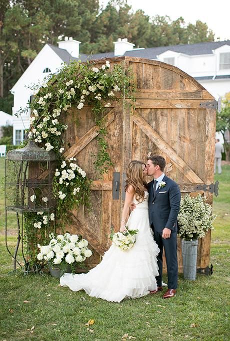 old barn door wedding ceremony backdrop