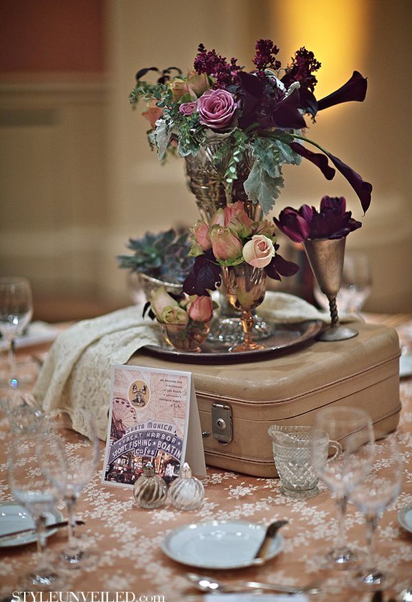 old vintage suitcase and teapot wedding centerpiece