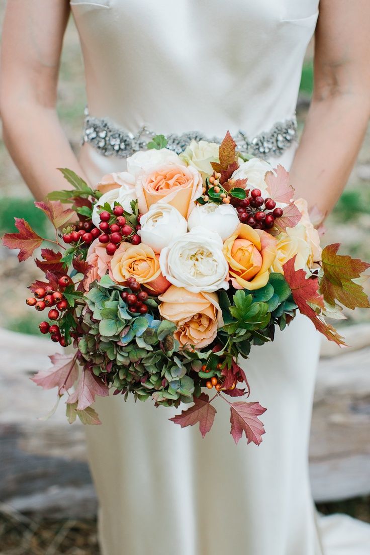 pastel coral pink roses and fall leaves wedding bouquet
