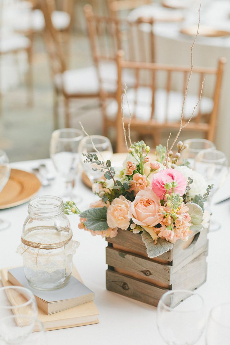 pastel coral pink roses in wooden box wedding tablescape