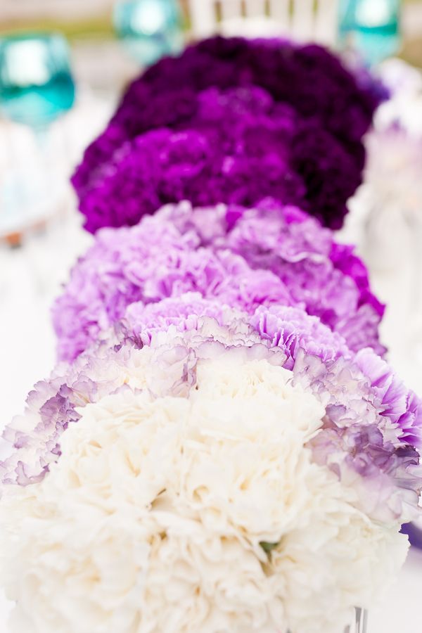 purple ombre centerpiece formed with bouquets