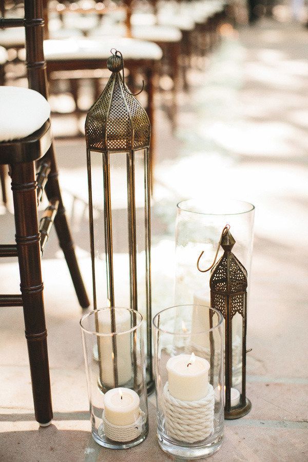 rustic lantern and candles wedding aisle decor