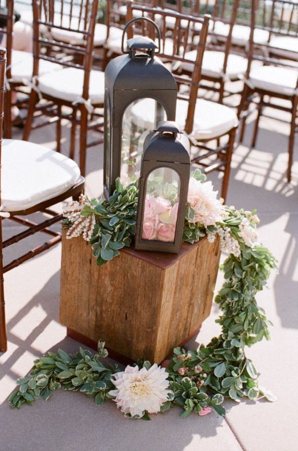 Gallery: rustic lantern and pink flowers wedding aisle decor - Deer