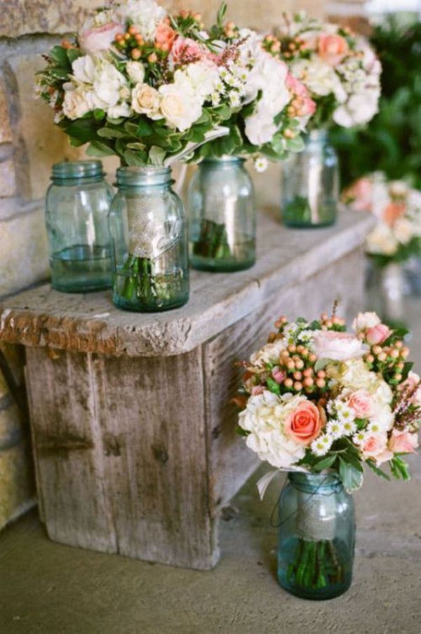 rustic wedding decoration ideas with flowers and blue mason jars